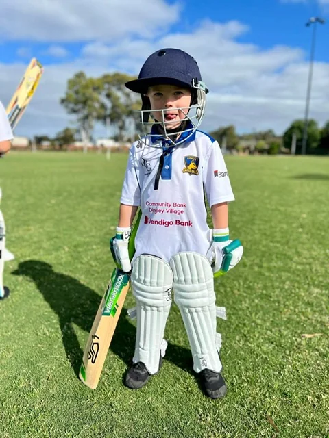 Young Dingley batter wearing cricket pads